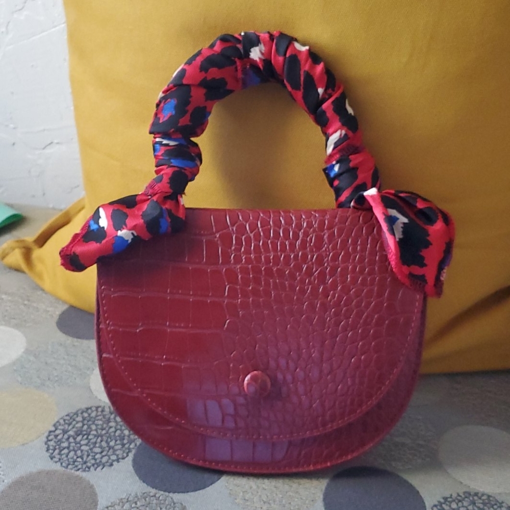 Red fashionable clutch